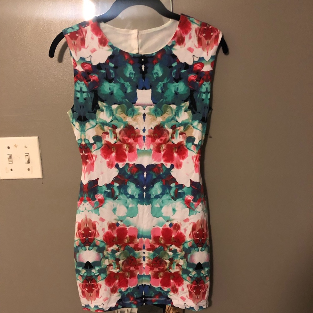 Akira mini dress with Keyhole back. Size • L •